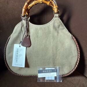 Gucci Pre-Owned
2000-2015 Bamboo line braided-trimming canvas handbag